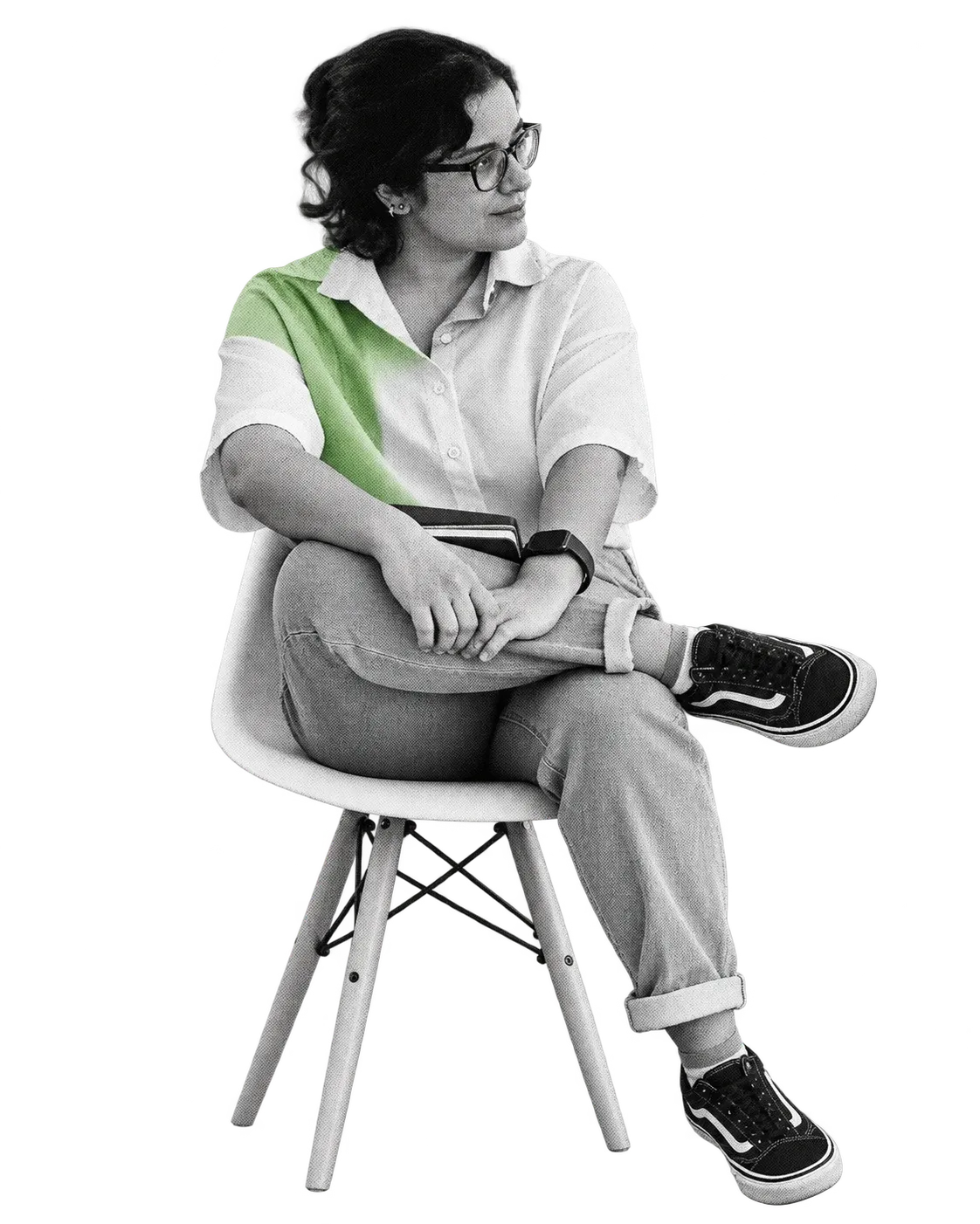 A participant sitting with a notebook and listening during Languages of the Heart