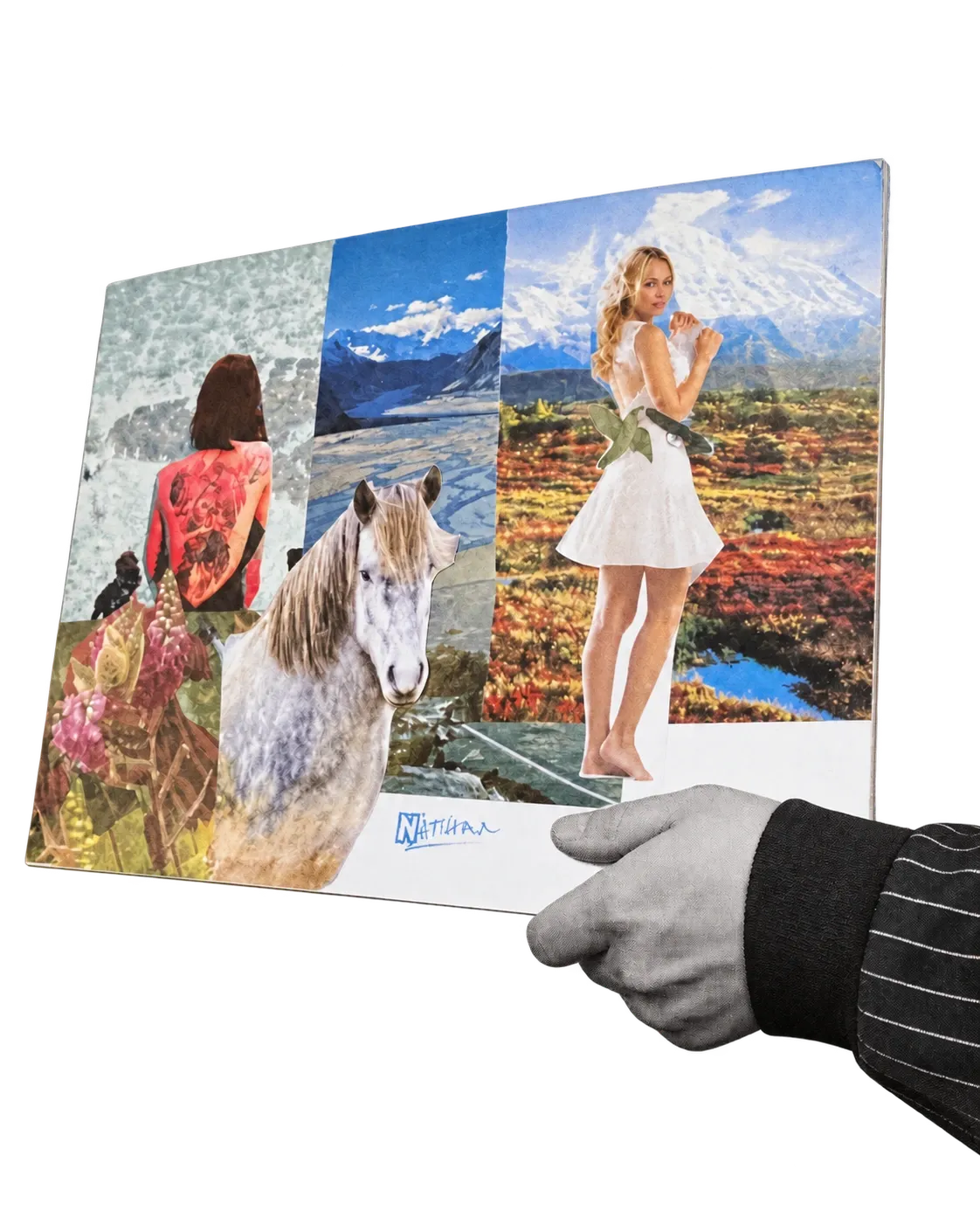 A participant holding a colourful finished magazine collage made during the Mental Bytes IPS retreat