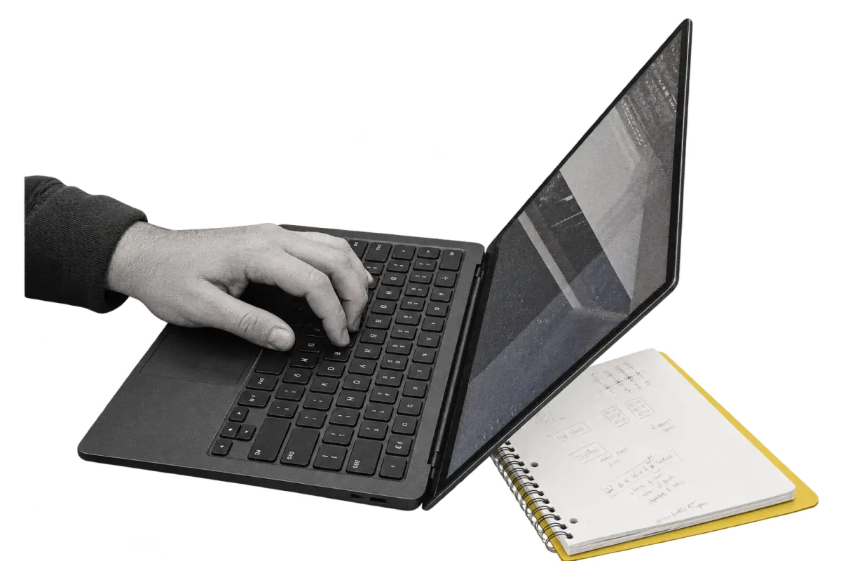 A photographic cutout of the laptop and typing hand used during a Mental Bytes retreat
